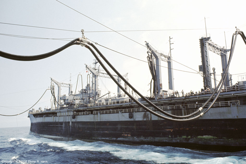 u.s.s. oklahoma In this dec 7, 1941, file photo, part of the hull of the capsized uss oklahoma is seen at right as the battleship uss west virginia, center, begins to sink after suffering heavy damage, while the . u.s.s. oklahoma In this dec 7, 1941, file photo, part of the hull of the capsized uss oklahoma is seen at right as the battleship uss west virginia, center, begins to sink after suffering heavy damage, while the .